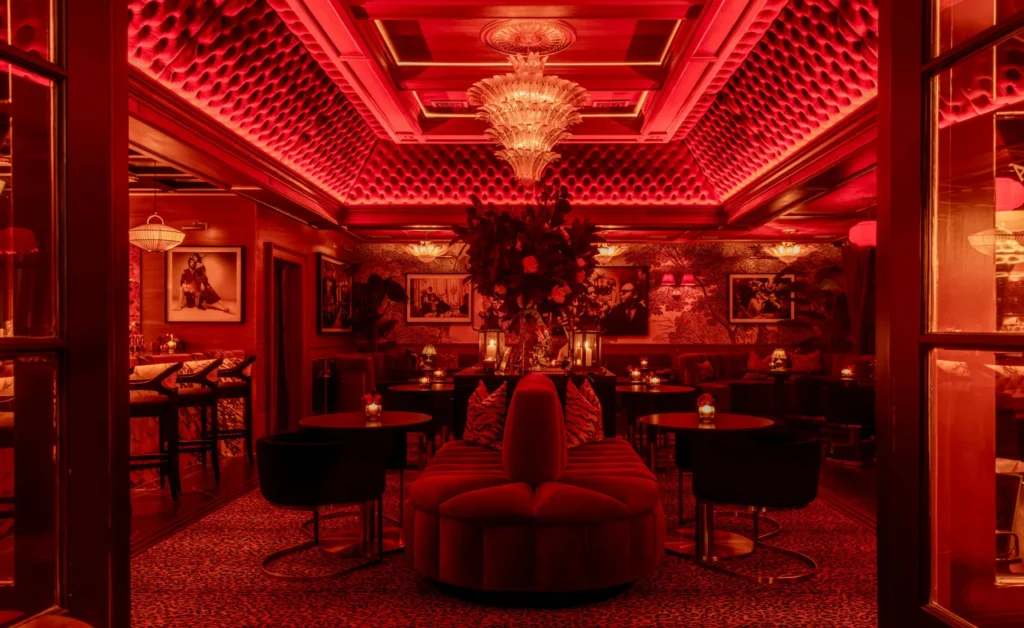 The glamorous new cocktail lounge Beaton’s at Bar Cecil in Palm Springs features lots of red velvet and moody lighting.